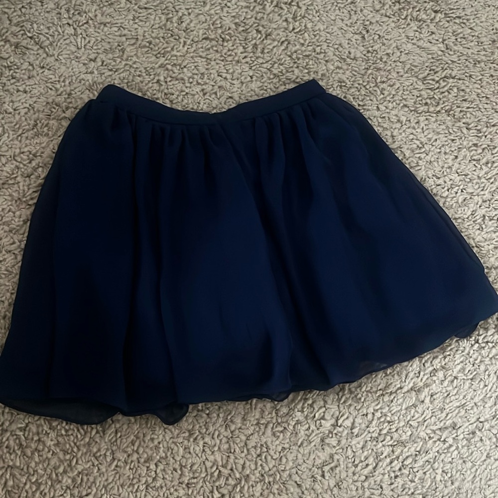 I am selling this navy blue skirt from B. Darlin. The size is 3/4. Barely worn